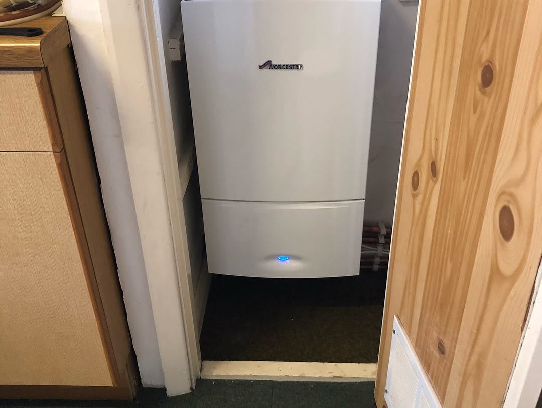 Worcester Bosch boiler installed inside a cupboard by Willsway