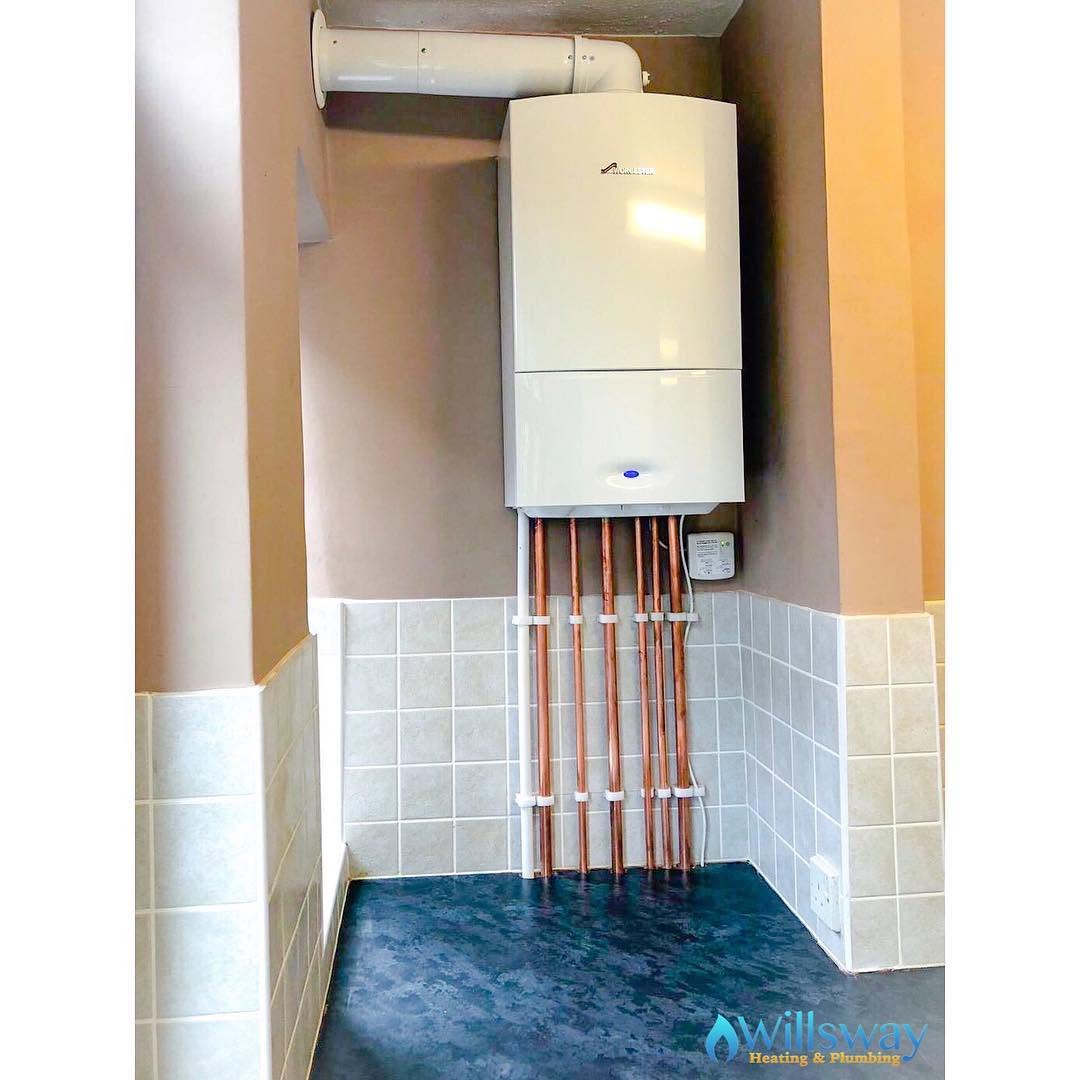 Worcester Bosch combi boiler neatly installed in an alcove