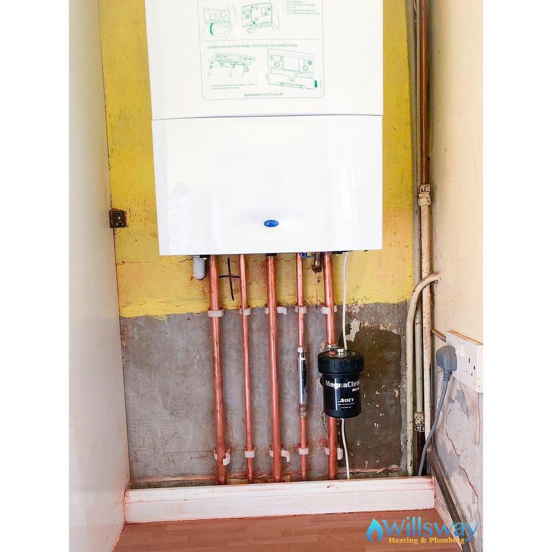 Worcester Bosch boiler with a new filter fitted during a repair visit